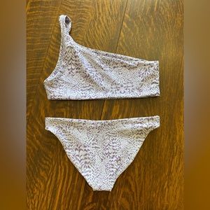 Skatie swim suit size XS top & bottom. Love but slightly to snug for me.